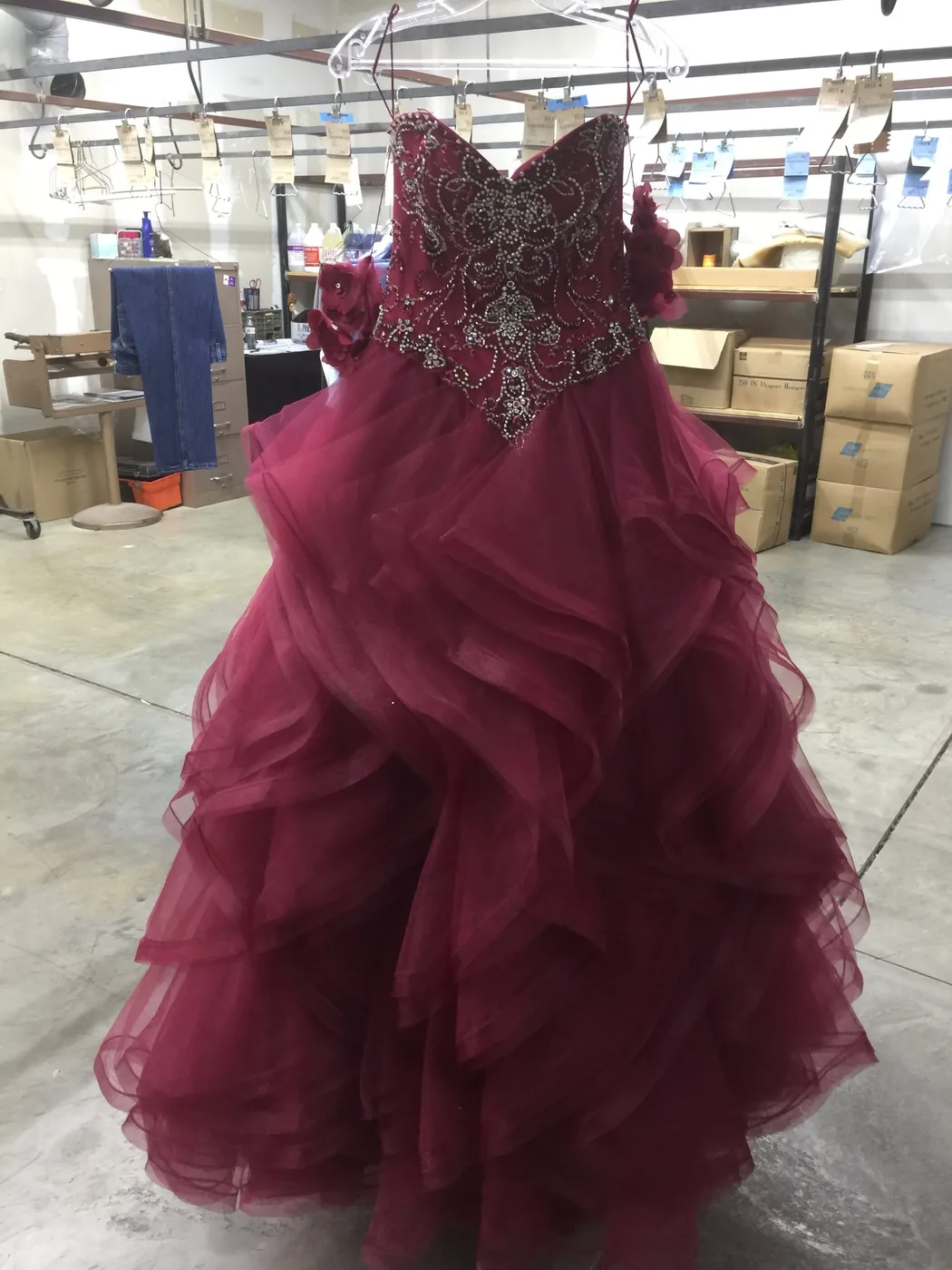 Burgundy ball gown cleaned and steamed